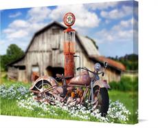 Canvas print of Vintage Bike At A Vintage Gas Pump by the artist D Young Art